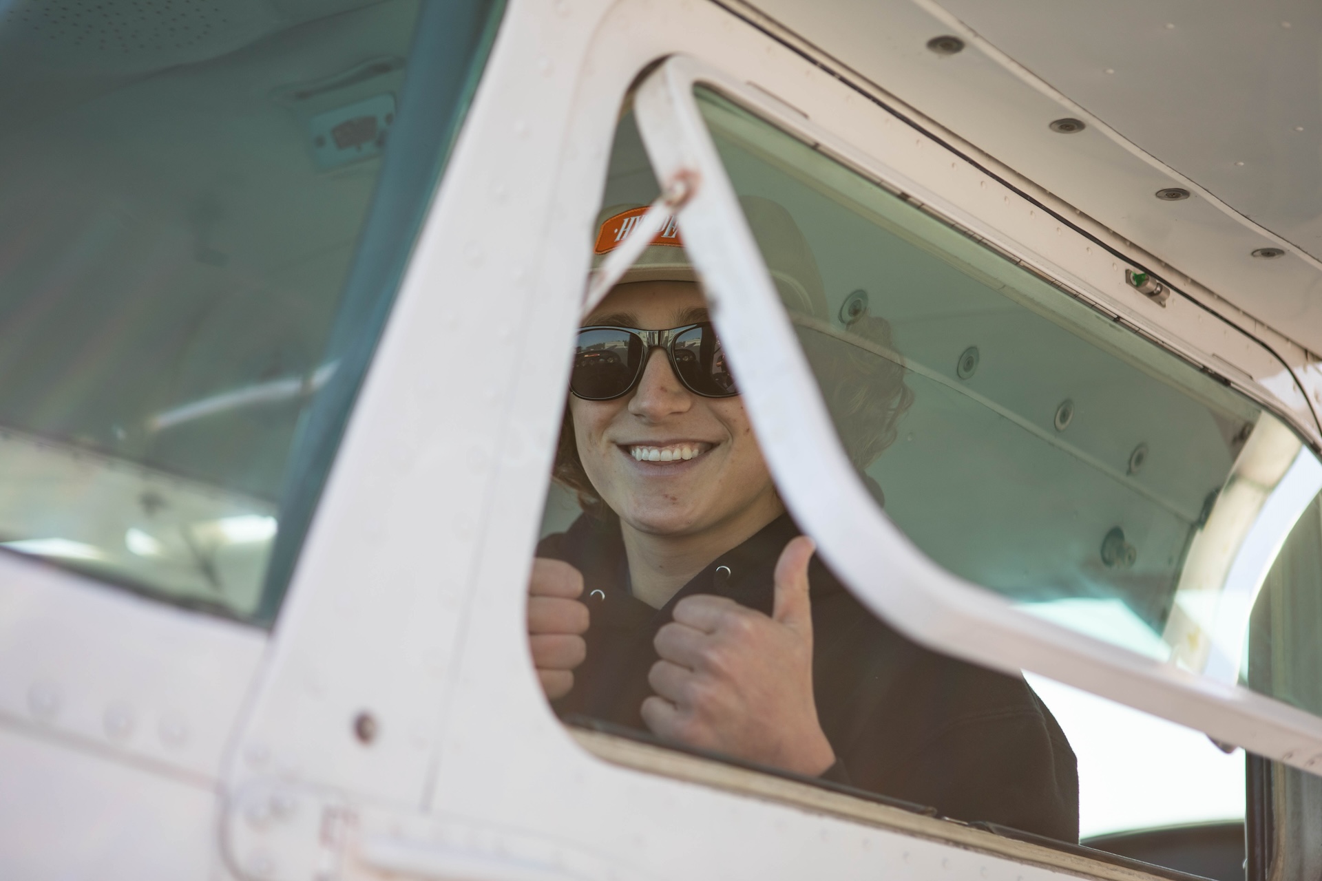Certified airplane pilot preparing for takeoff