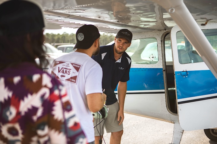 Tour guide with guests at High Tide Aviation